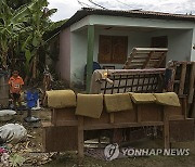 CORRECTION Cuba Hurricane Oscar Aftermath