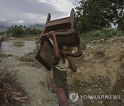 CORRECTION Cuba Hurricane Oscar Aftermath