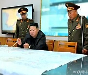 [속보] 김정은 "ICBM 발사, 적 대응 의지…핵무력 강화노선 절대 안바꿔"