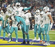 APTOPIX Dolphins Rams Football