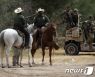 백악관, 말 타고 아이티 난민들 짐승몰이한 국경순찰대 전수조사