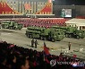 북한, 3개월 만에 열병식 열고 국방력 과시..지대지 미사일 추정 무기도