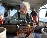 APTOPIX Centenarian Lobsterwoman