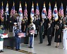 Moon flies home with remains of 68 Korean War heroes