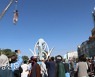 탈레반, 광장 크레인에 시신 4구 걸어..공포정치 부활