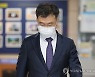 조사 마치고 경찰서 나서는 김만배