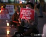 무주택자들 "오징어 게임보다 잔혹한 삶"..부동산 정책 비판 '촛불시위'