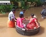 '홍수 극복한 사랑' 인도 커플, 대형냄비 타고 결혼식 참석[영상]