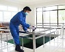 '대중적 방역 분위기 고조'..소독하는 양어사업소