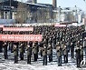 북한 노동자들 '전원회의 결정 관철' 궐기대회