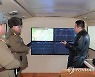 북 "극초음속미사일 연속 발사 성공..김정은 참관"