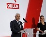 POLAND BUSINESS PKN ORLEN MOL ARAMCO ACQUISITION