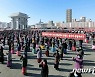 북한 여맹원, 전원회의 관철 다짐 궐기대회 진행