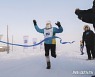 결승점 들어온 세계 가장 추운 마라톤 대회 참가자