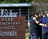 '총에는 총으로 맞서야' 텍사스 초등학교 참사에 또 '교사 무장론'