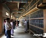"팔만대장경 없애야 남북통일" 방화 협박 전화한 60대 남성