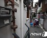 무더운 쪽방촌