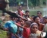 '최악 홍수' 강타한 방글라데시..최소 207명 숨지고 700만 이재민