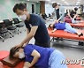 장애인기능대회 안마 직종 참가한 선수들