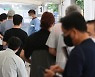 Korea's Covid-19 cases dip but remain in 100,000s