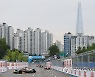 잠실을 배경으로