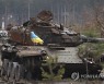 APTOPIX Russia Ukraine War TvBoy